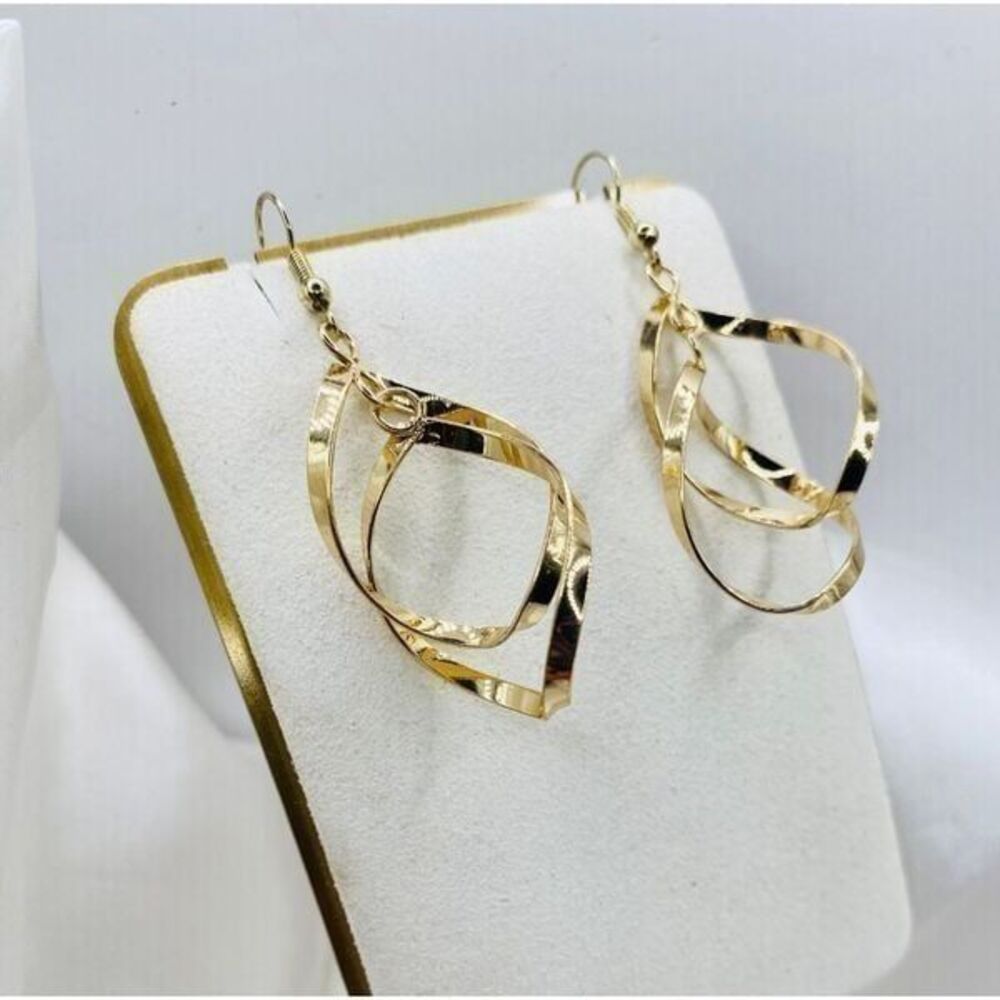 Gold toned twist dainty Dangle hook earrings.